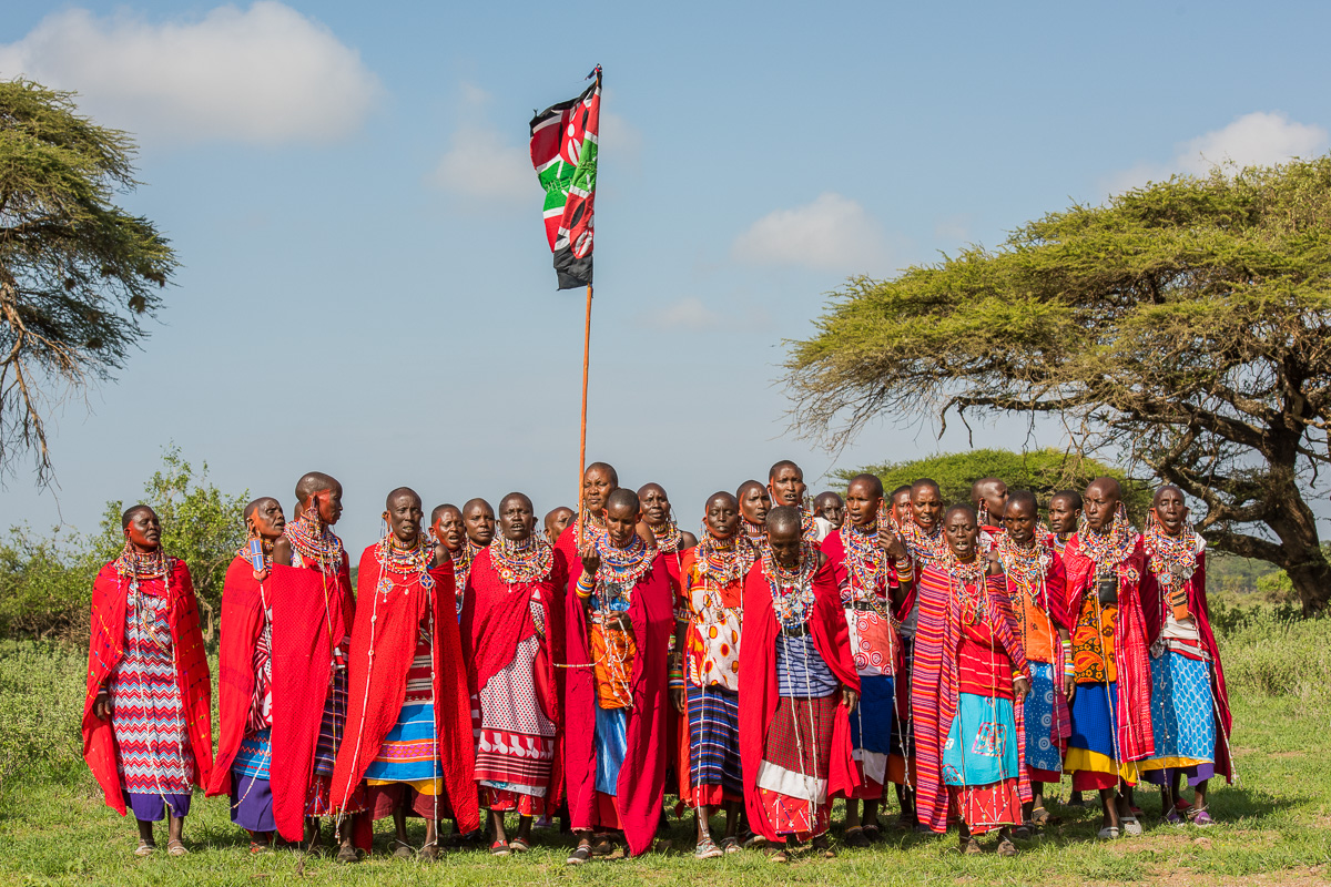 Each of the 4 manyattas (villages) competing in these final events has a colorful, enthusiastic cheering section composed of women from the manyatta: mothers, sisters, girlfriends, wives of the warrior athletes.